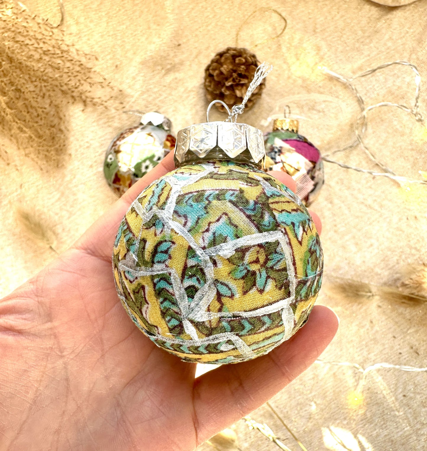green and yellow fabric bauble