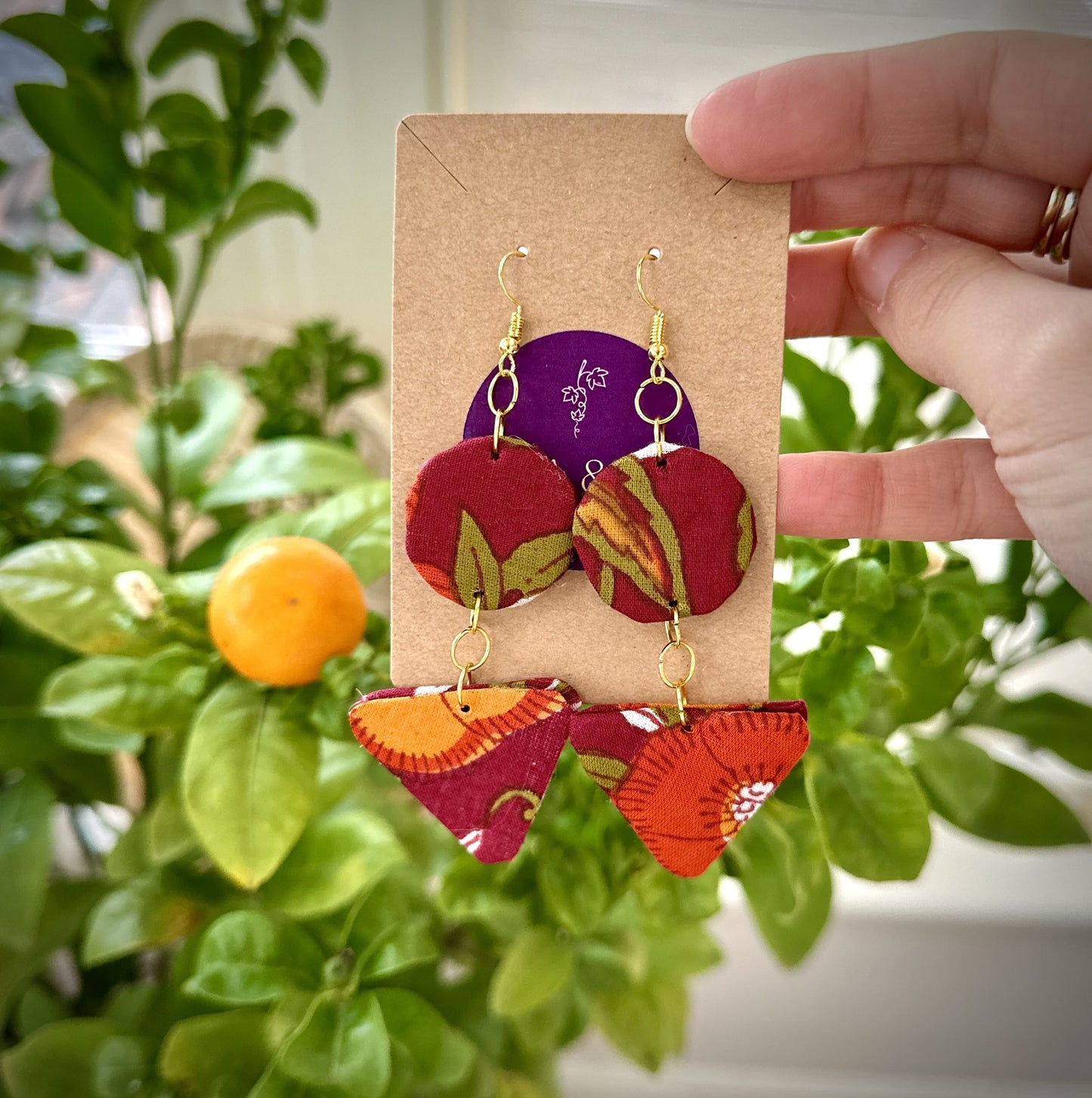 Large red/orange floral fabric dangle earrings