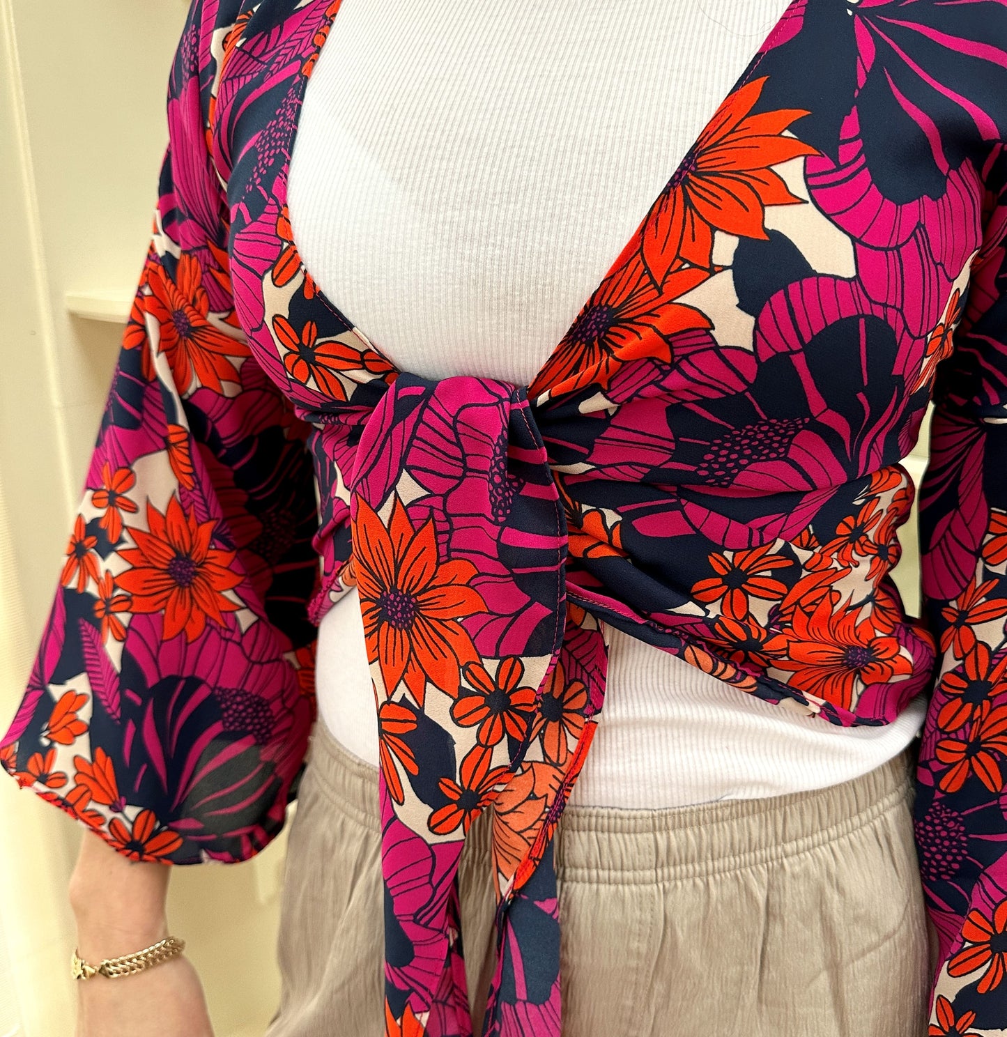 floral tie front blouse with flared sleeves, in pink and orange