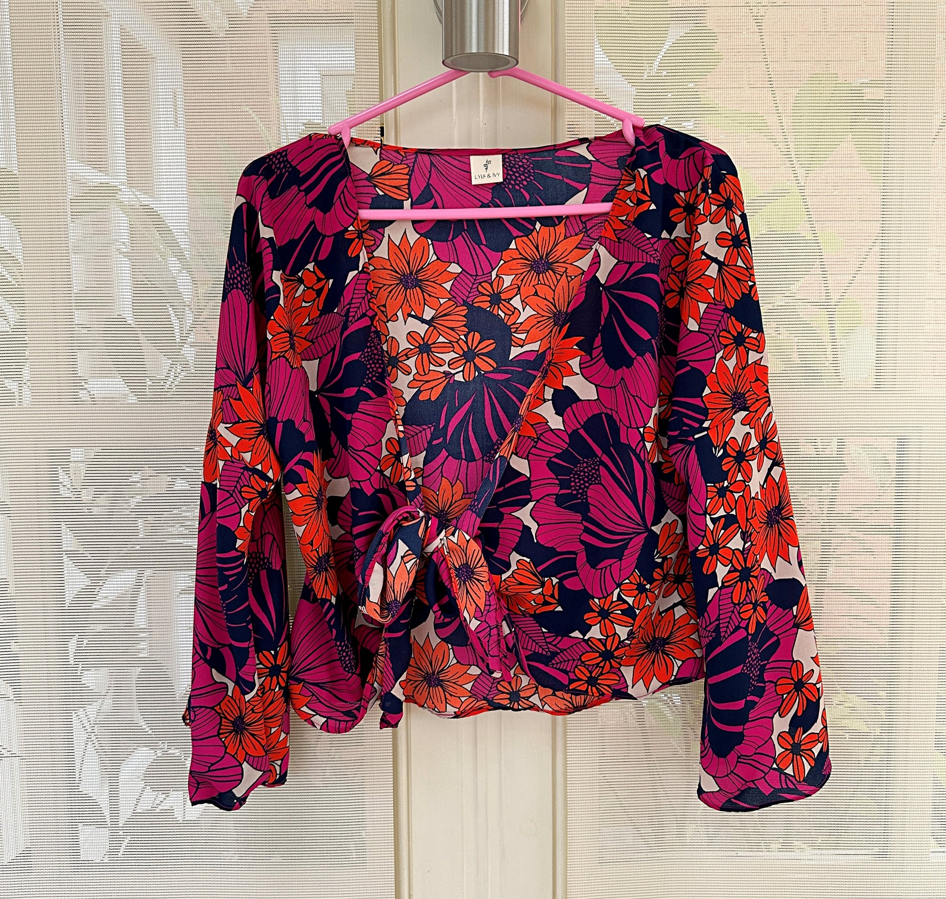 floral tie front blouse with flared sleeves, in pink and orange