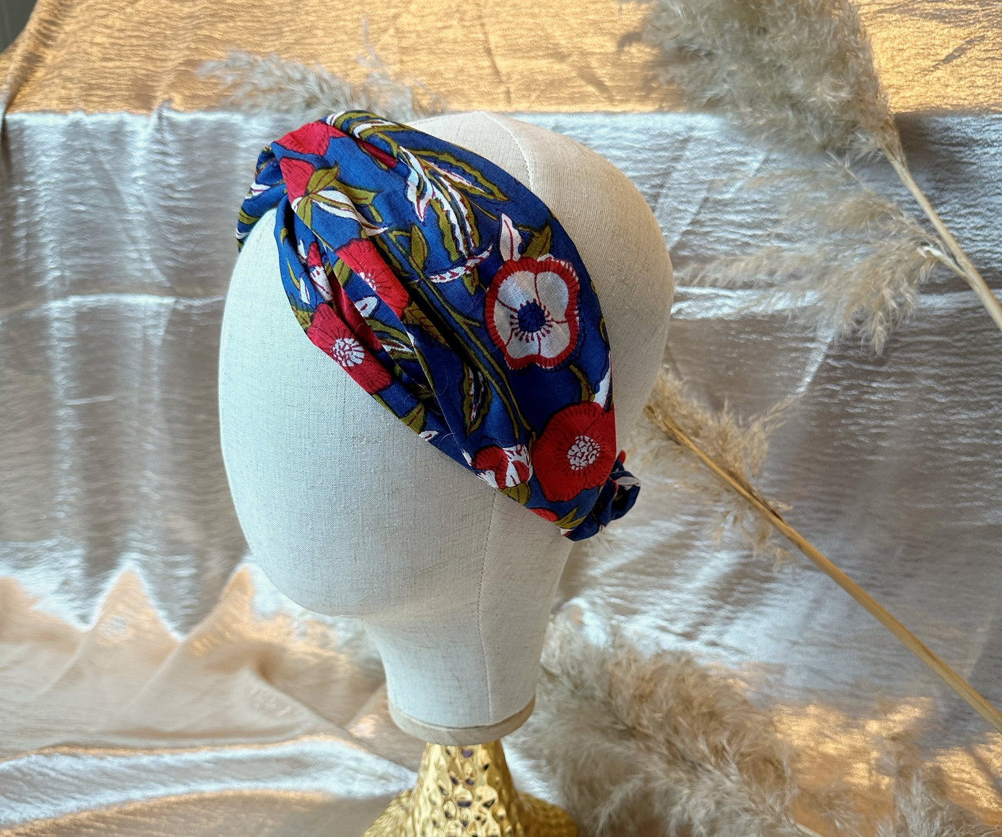 side view of blue floral headband