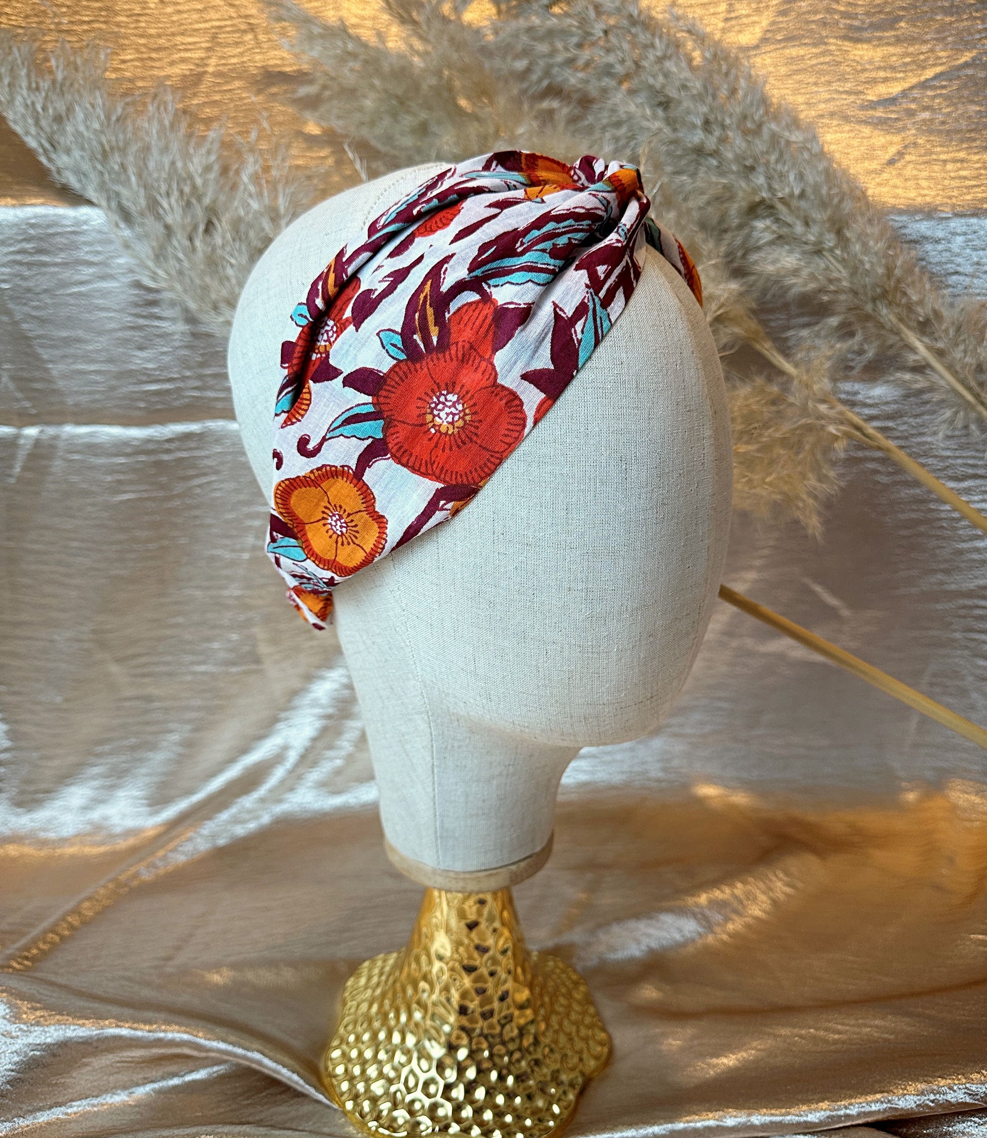 side view of floral twist knot headband